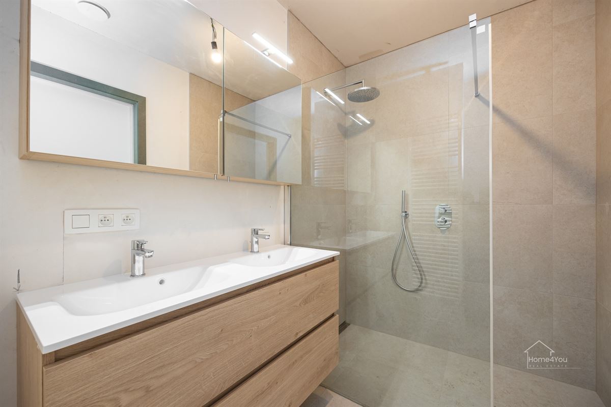 Nieuwbouw gelijkvloers appartement met aangename tuin