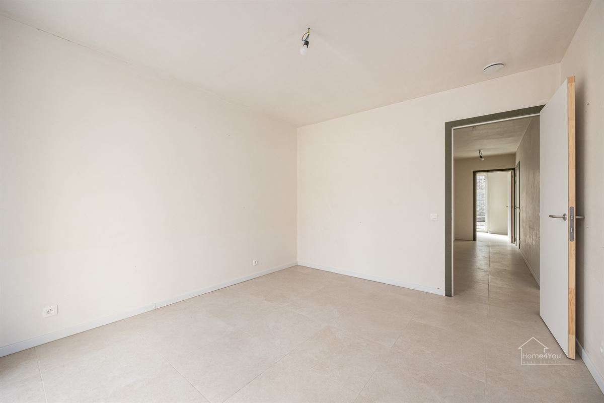 Nieuwbouw gelijkvloers appartement met aangename tuin