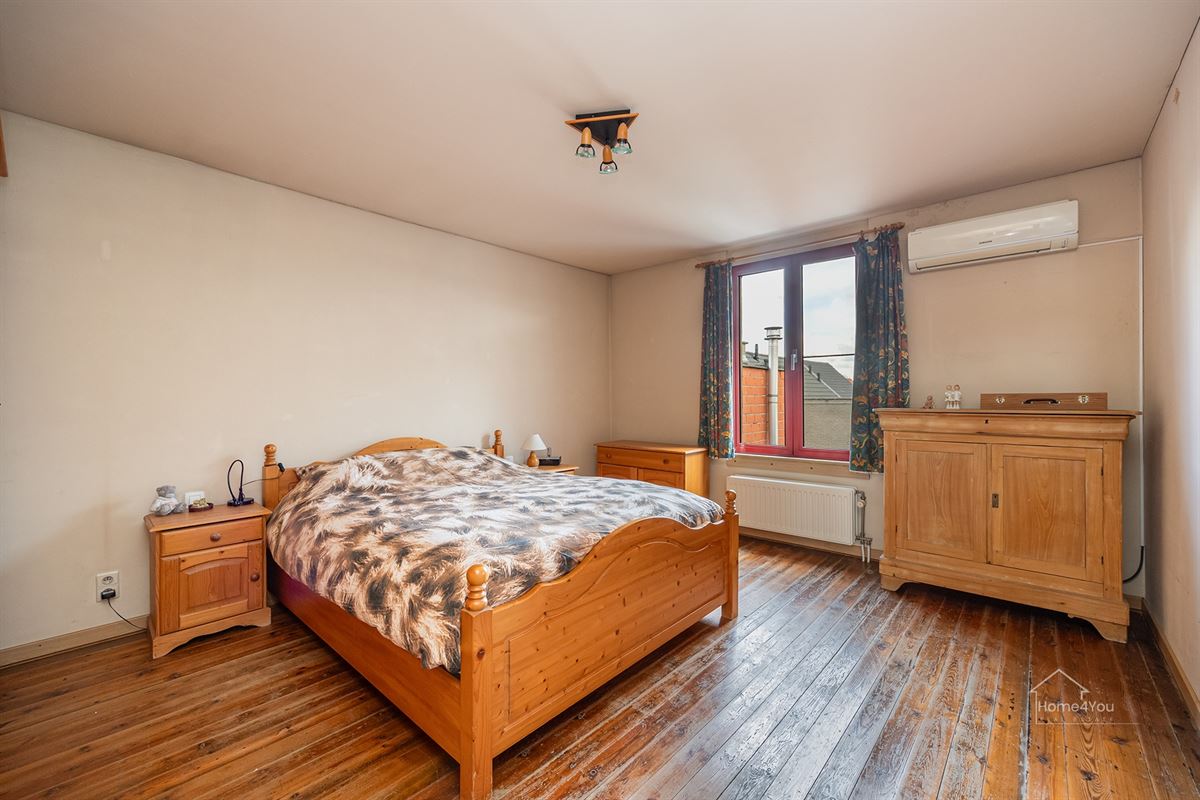 Veelzijdig handelshuis met ruim duplex appartement