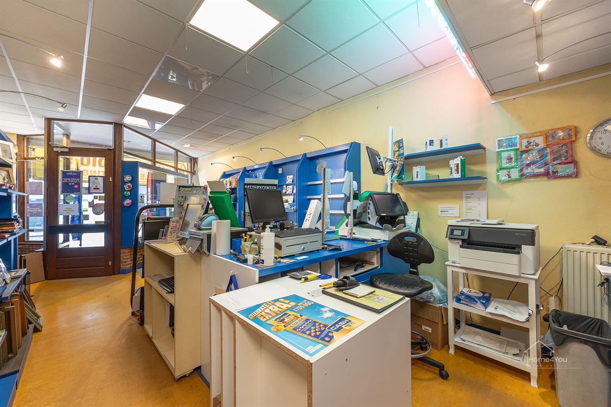 Veelzijdig handelshuis met ruim duplex appartement