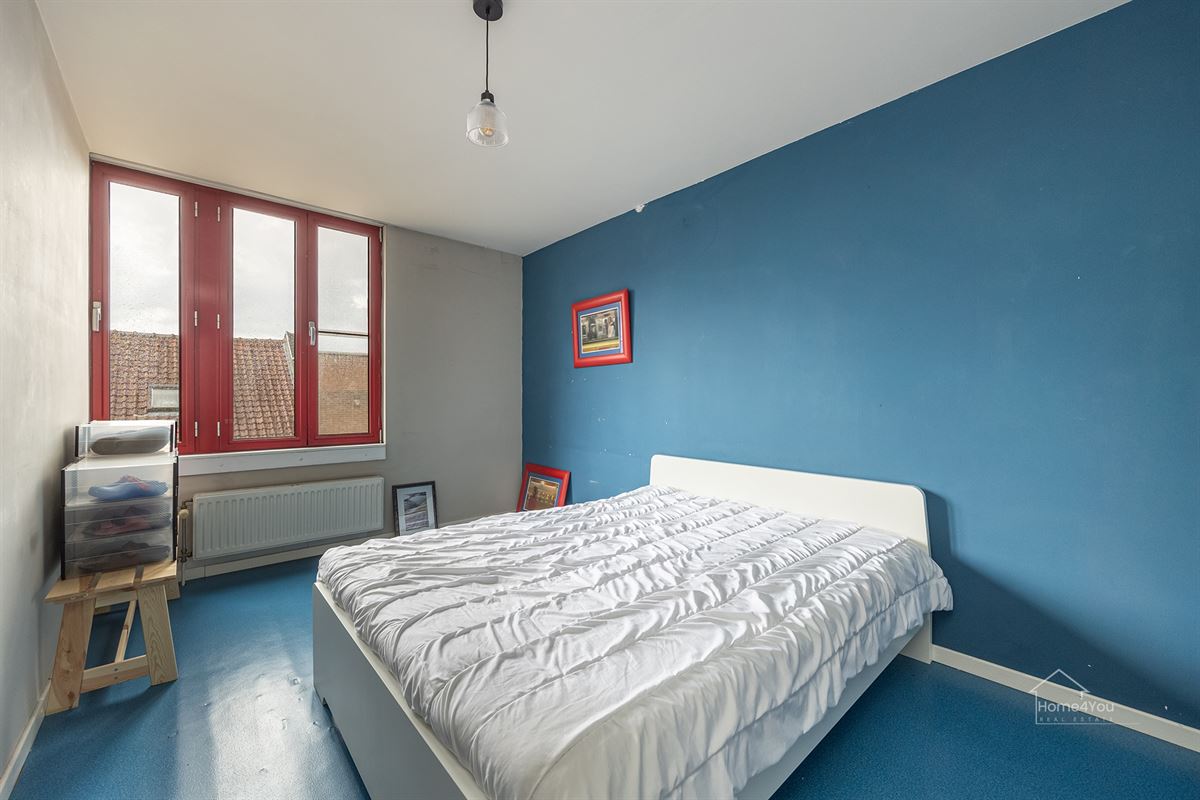 Veelzijdig handelshuis met ruim duplex appartement