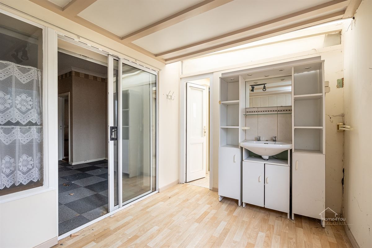 Te renoveren woning met groot potentieel en tuin te Bornem