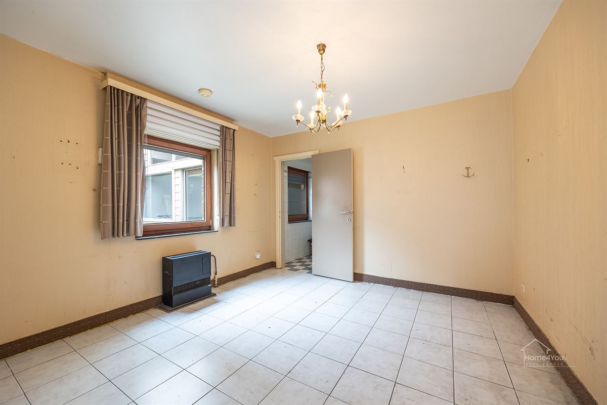 Te renoveren woning met groot potentieel en tuin te Bornem