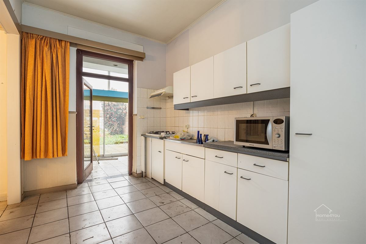 Te renoveren woning met groot potentieel en tuin te Bornem