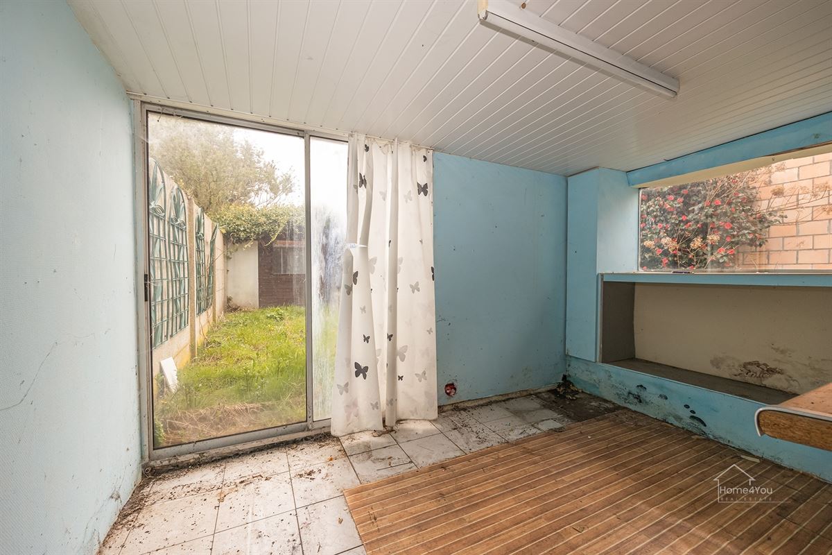 Te renoveren woning met groot potentieel en tuin te Bornem