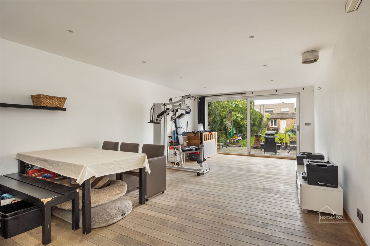 Instapklare woning met ruime tuin in Antwerpen te koop!