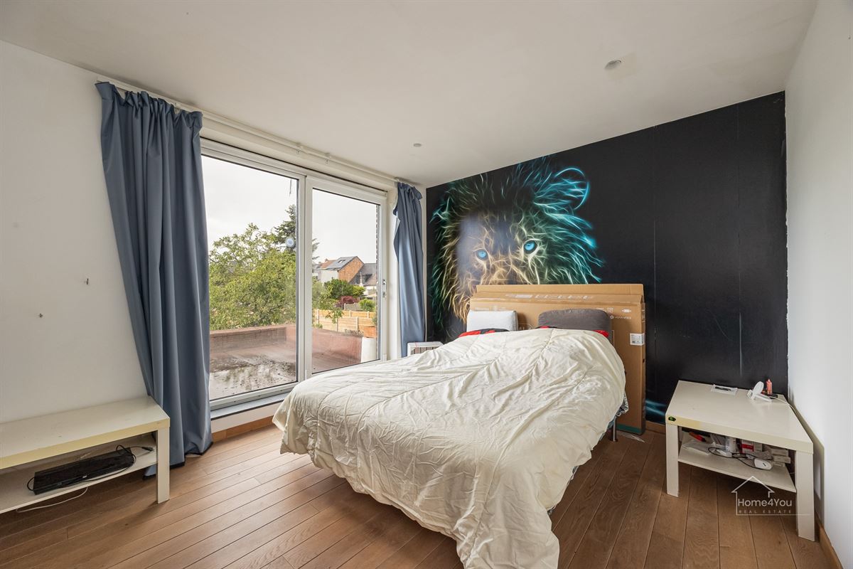 Instapklare woning met ruime tuin in Antwerpen te koop!