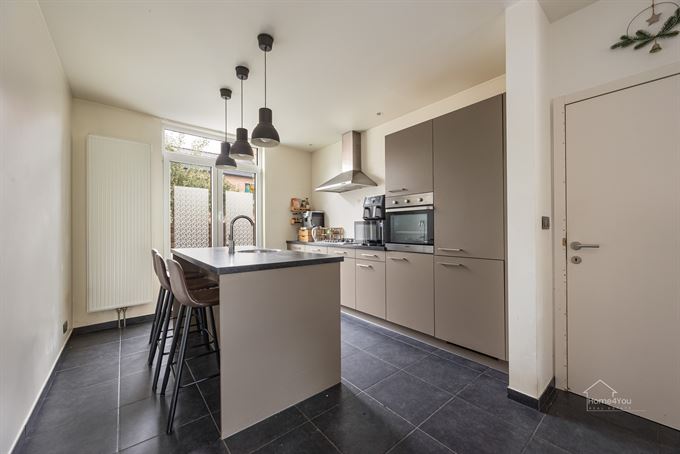 Instapklare woning met ruime tuin in Antwerpen te koop!