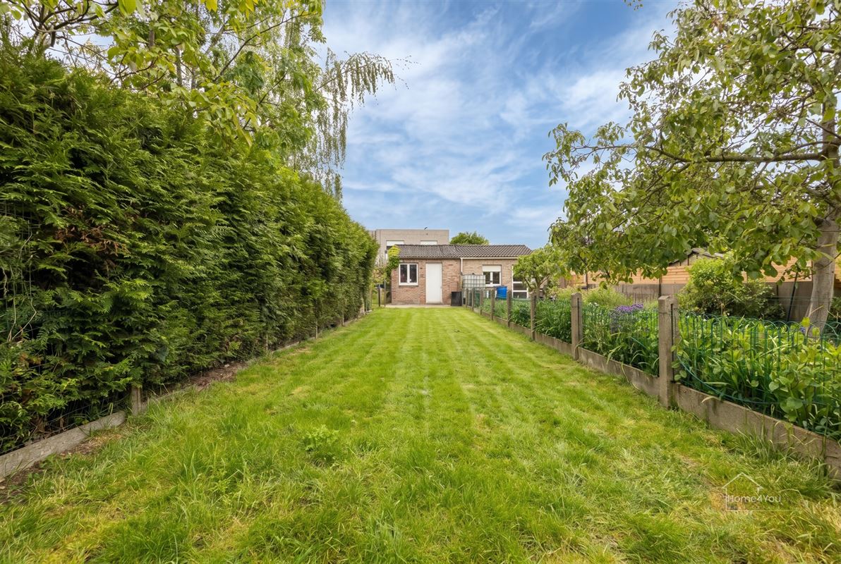 Instapklare woning met ruime tuin in Antwerpen te koop!