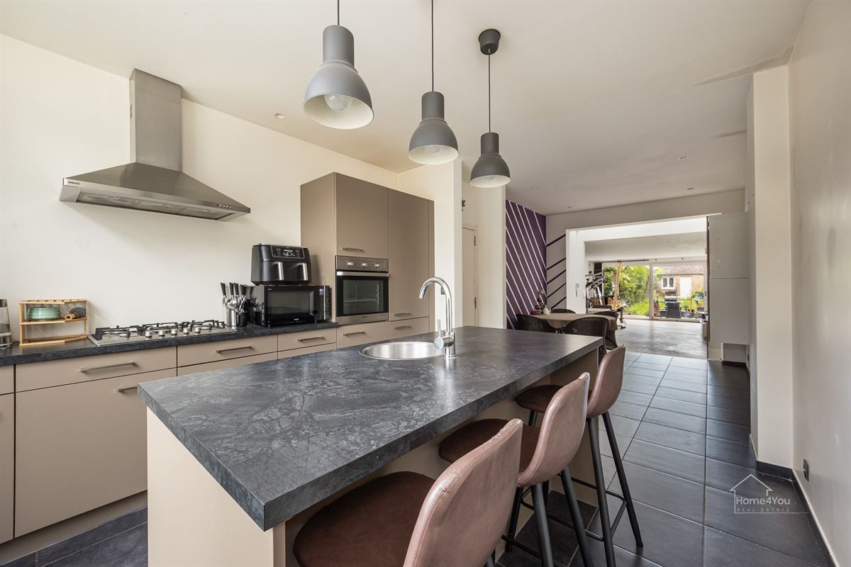 Instapklare woning met ruime tuin in Antwerpen te koop!