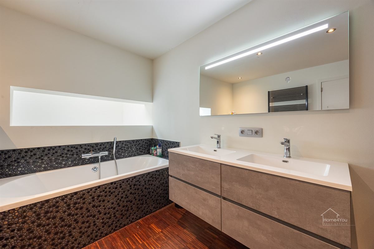 Instapklare woning met ruime tuin in Antwerpen te koop!