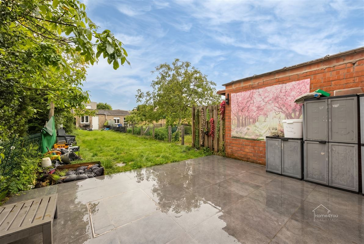 Instapklare woning met ruime tuin in Antwerpen te koop!