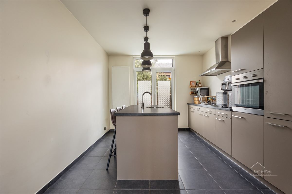 Instapklare woning met ruime tuin in Antwerpen te koop!