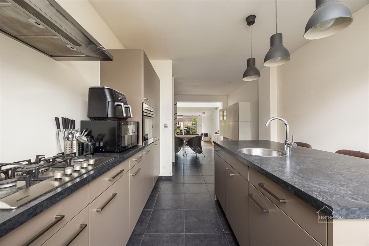 Instapklare woning met ruime tuin in Antwerpen te koop!