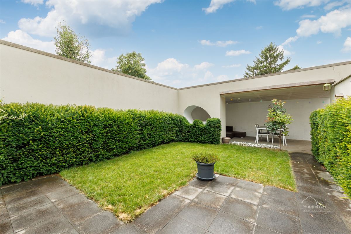 Instapklare gezinswoning met gezellige tuin