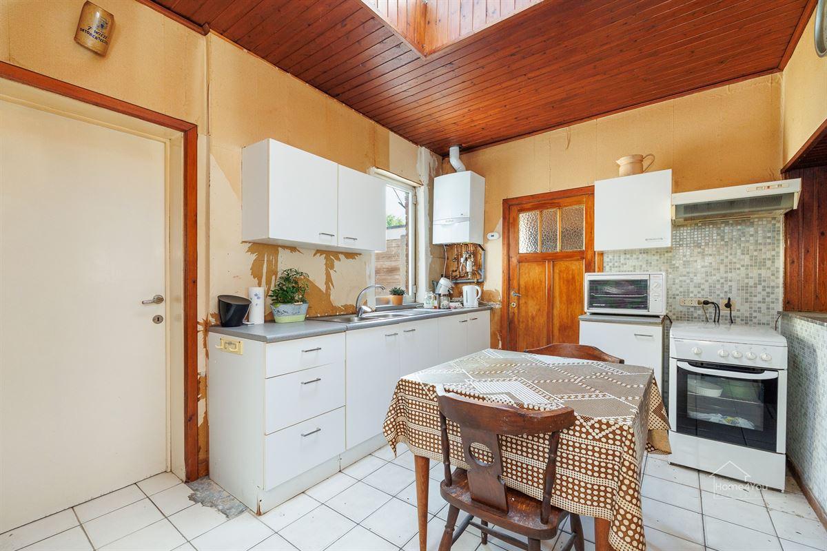 Te renoveren woning met ruime tuin en uitbreidingsmogelijkheden in Schelle