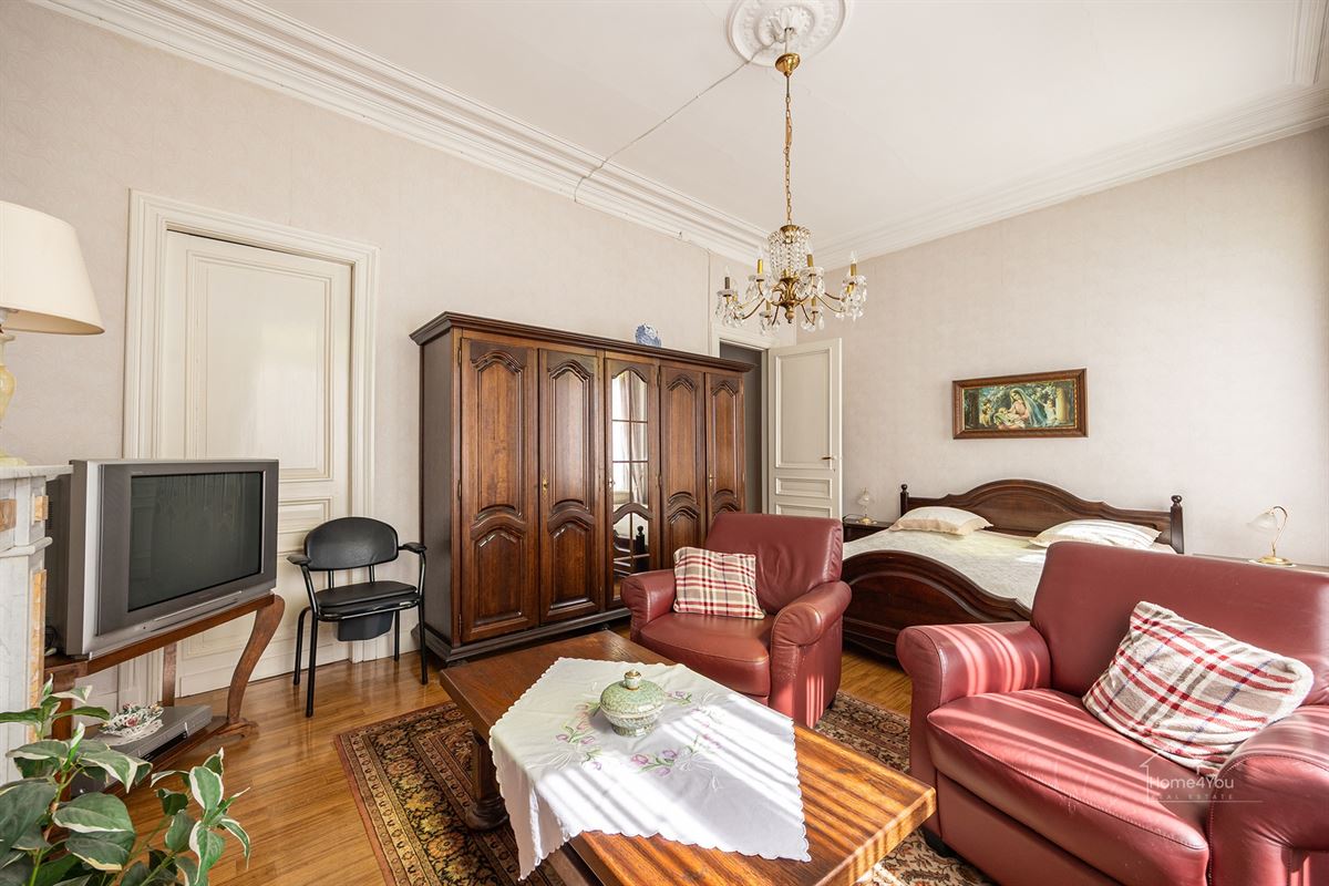Authentiek herenhuis met 5 slaapkamers en tuin.