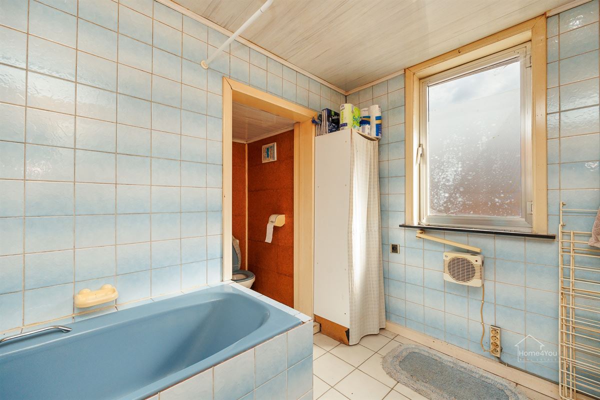 Te renoveren woning met ruime tuin en uitbreidingsmogelijkheden in Schelle