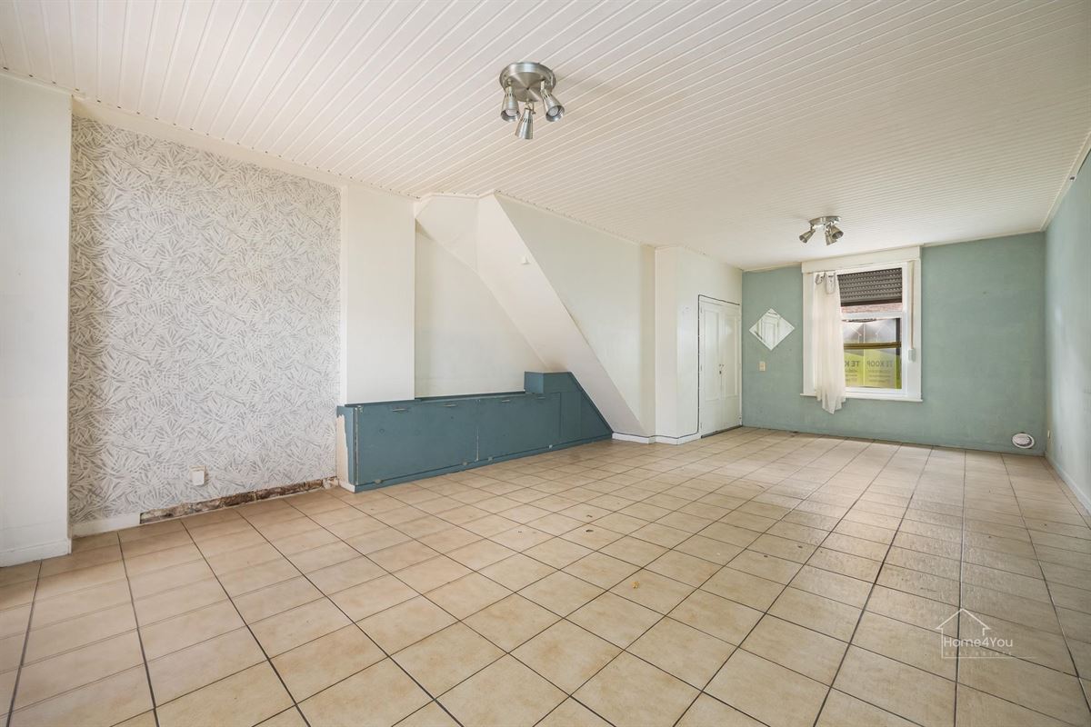 Te renoveren woning met 2 woonentiteiten + tuin