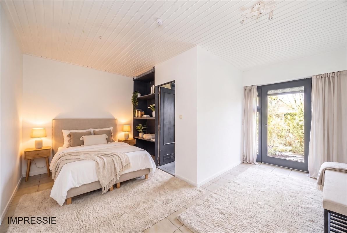 Te renoveren woning met 2 woonentiteiten + tuin