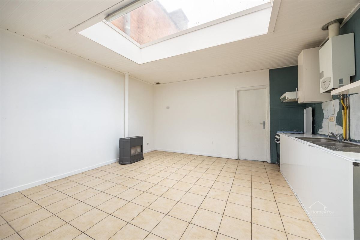 Te renoveren woning met 2 woonentiteiten + tuin