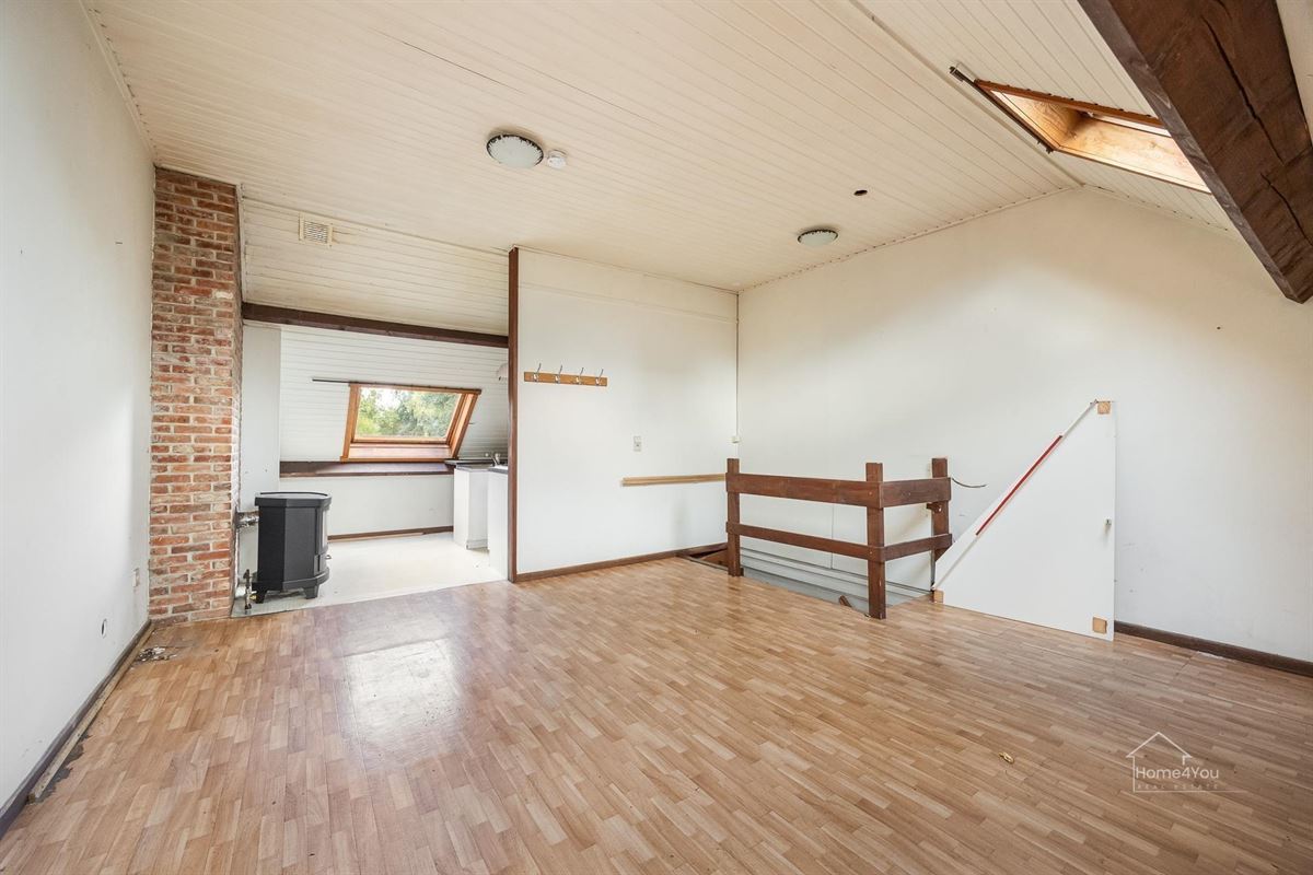 Te renoveren woning met 2 woonentiteiten + tuin