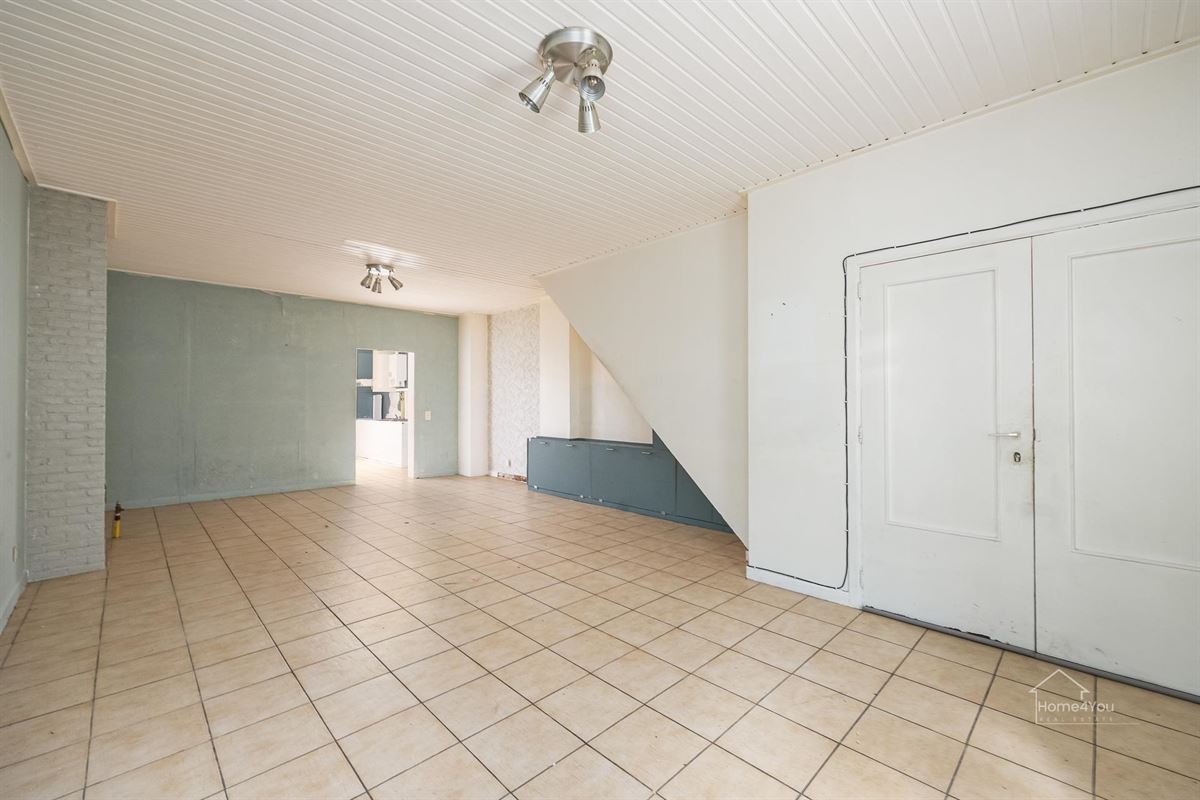 Te renoveren woning met 2 woonentiteiten + tuin