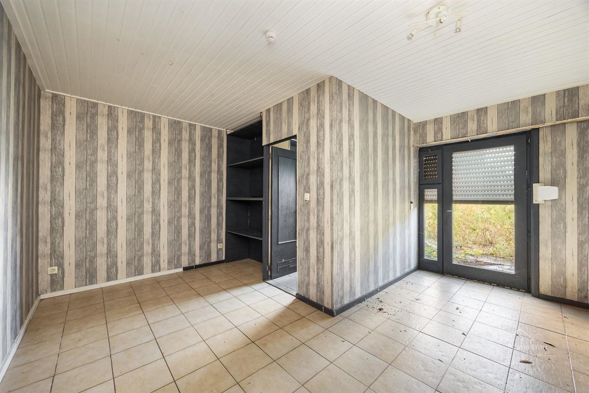 Te renoveren woning met 2 woonentiteiten + tuin