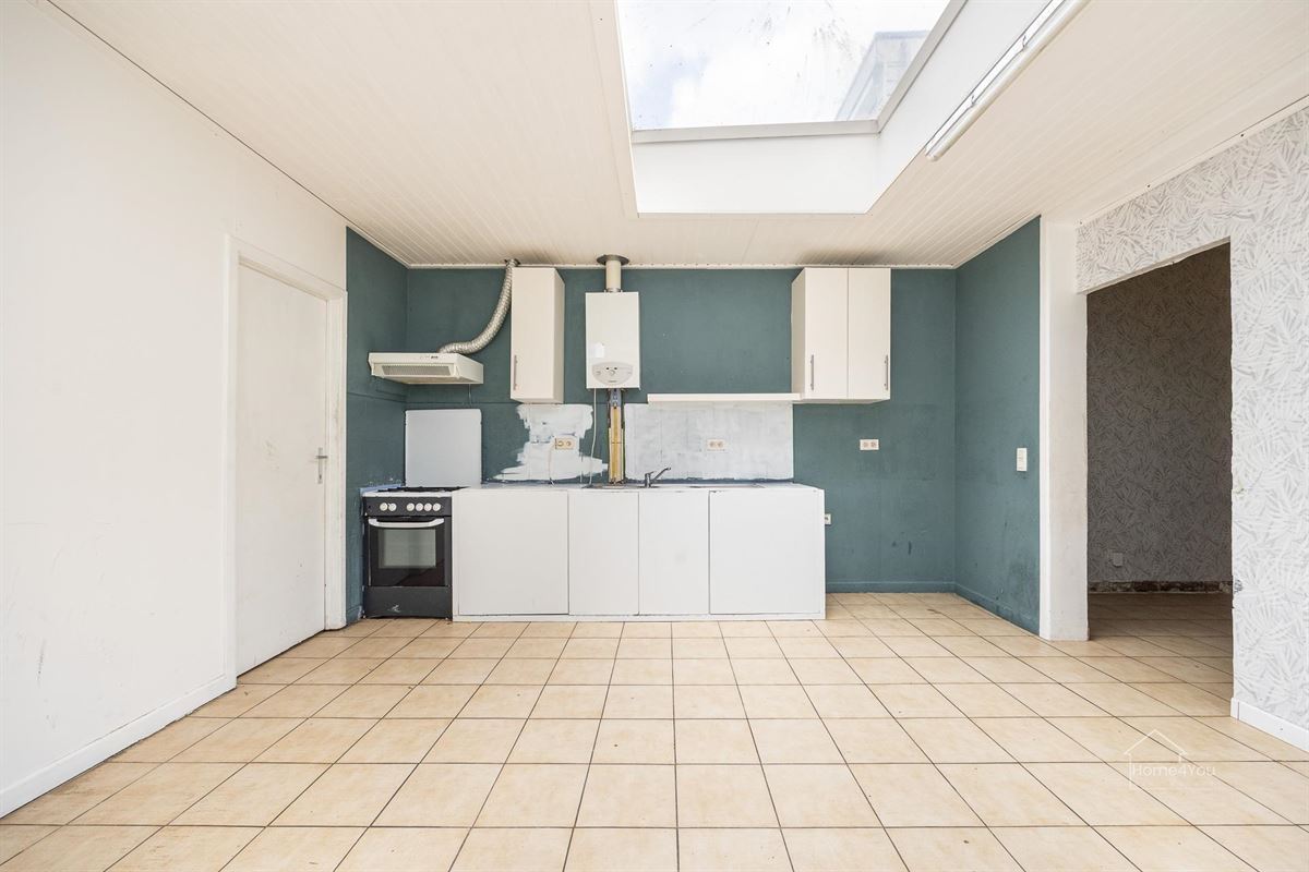 Te renoveren woning met 2 woonentiteiten + tuin