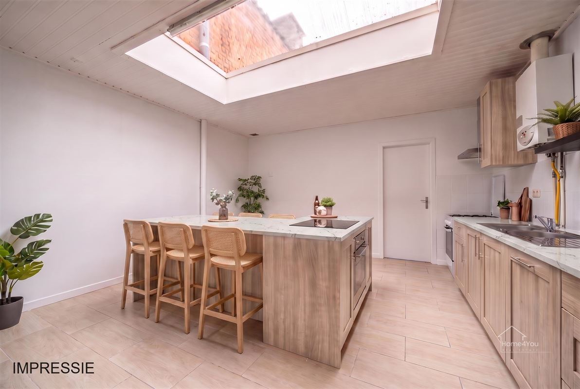 Te renoveren woning met 2 woonentiteiten + tuin