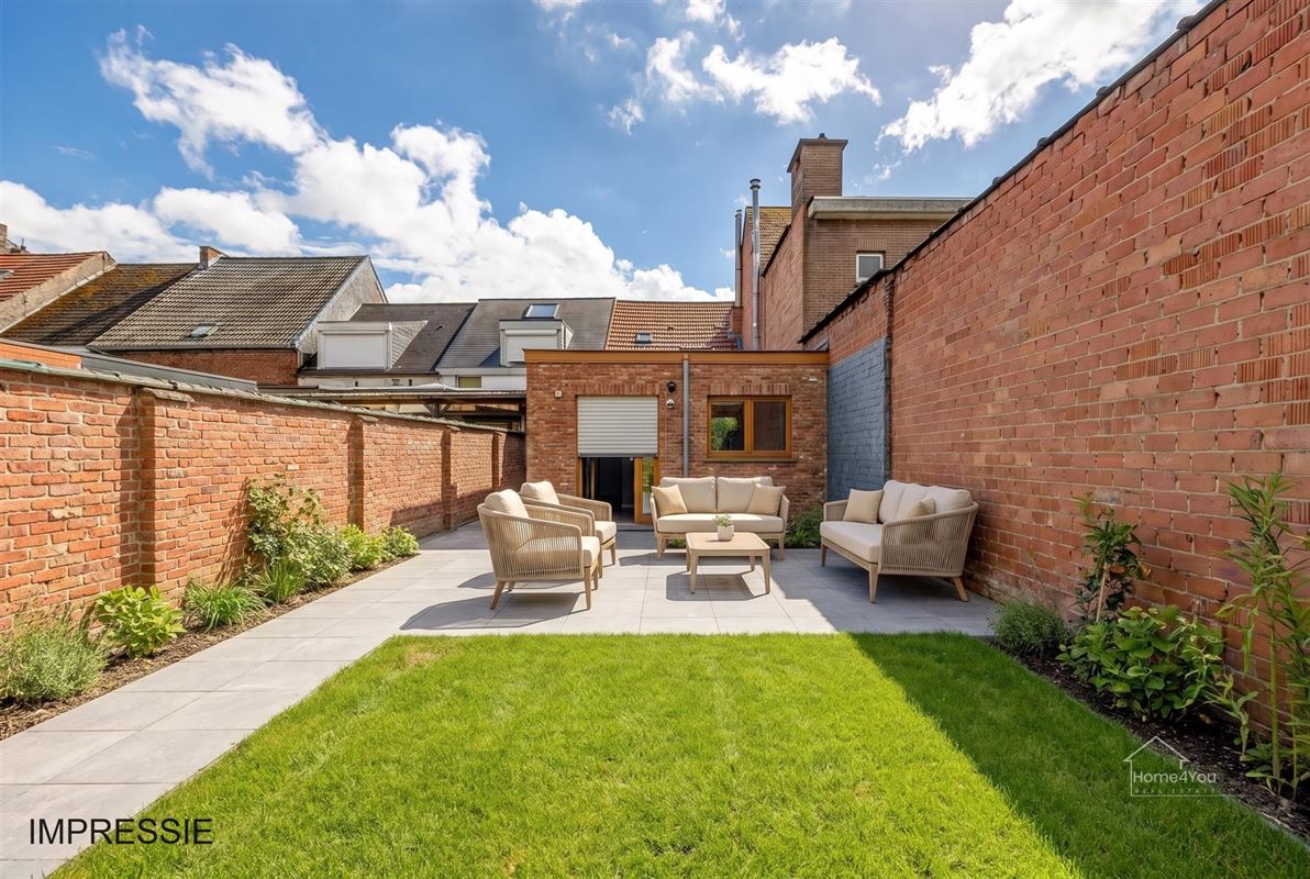 Te renoveren woning met 2 woonentiteiten + tuin