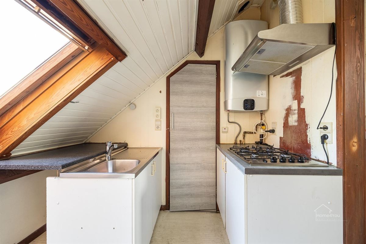 Te renoveren woning met 2 woonentiteiten + tuin