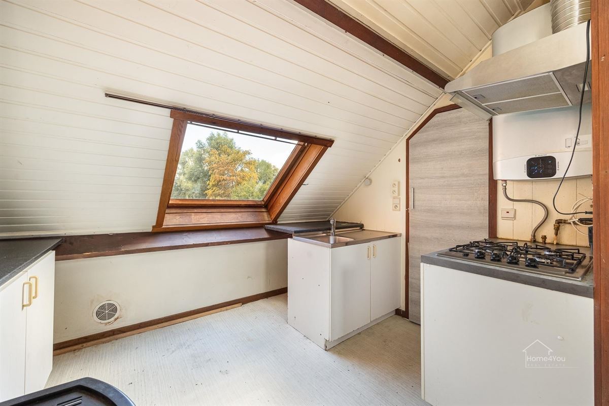 Te renoveren woning met 2 woonentiteiten + tuin