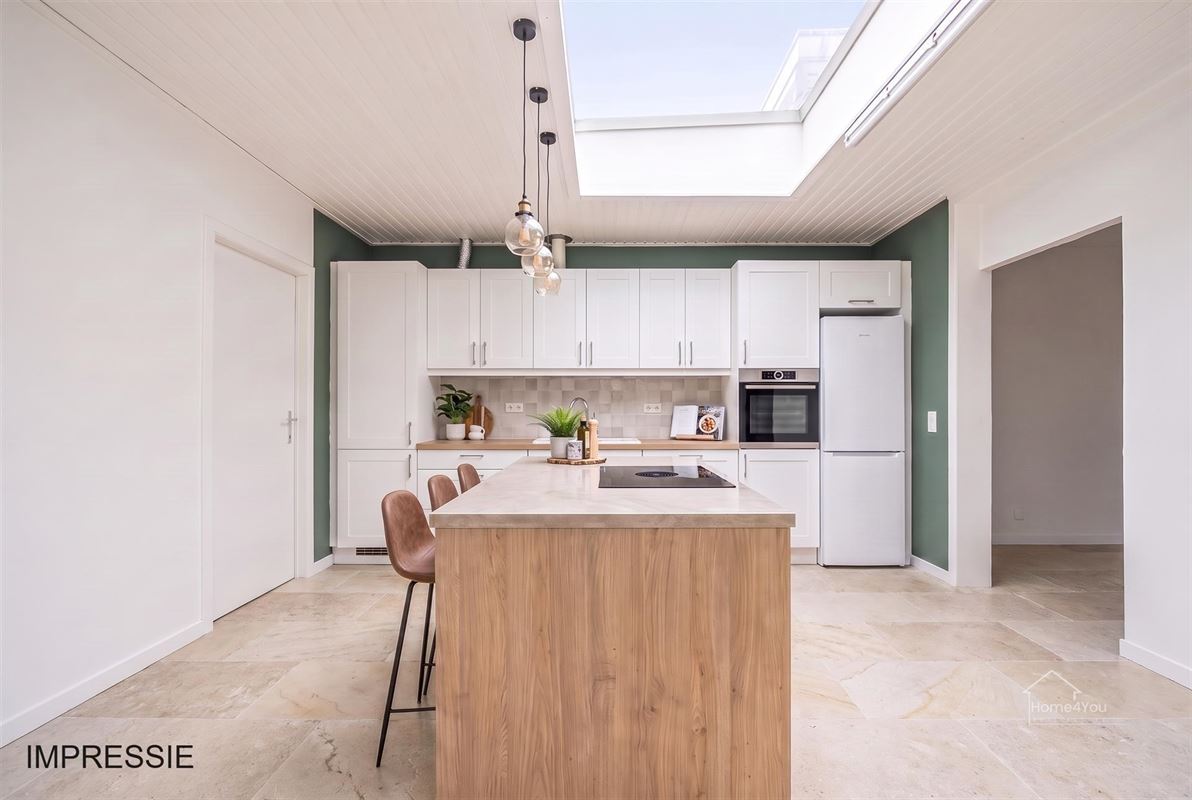 Te renoveren woning met 2 woonentiteiten + tuin