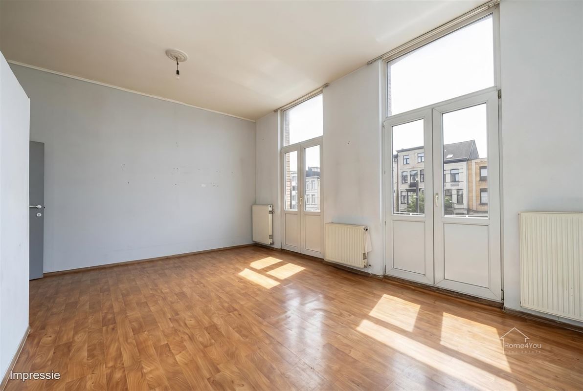 Handelshuis met 4 woonentiteiten en tuin