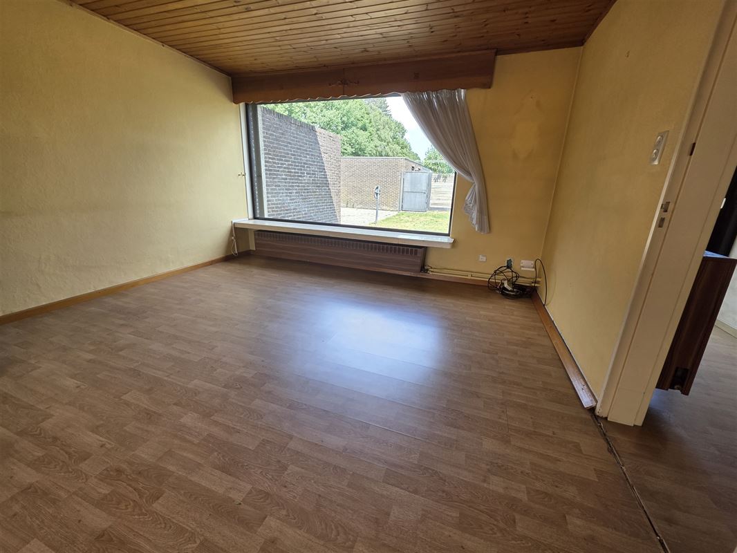 Knappe gezinswoning met 4 à 5 slpks, garage en tuin