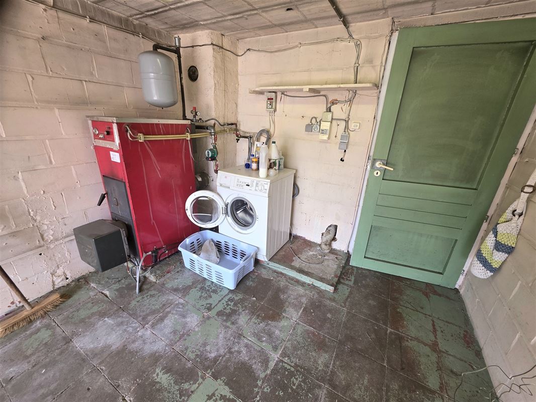 Knappe gezinswoning met 4 à 5 slpks, garage en tuin