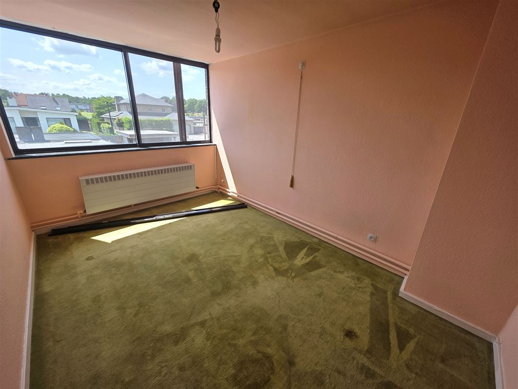 Knappe gezinswoning met 4 à 5 slpks, garage en tuin