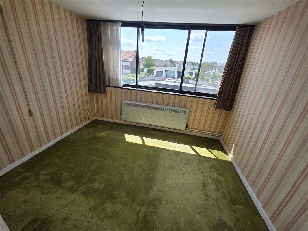 Knappe gezinswoning met 4 à 5 slpks, garage en tuin