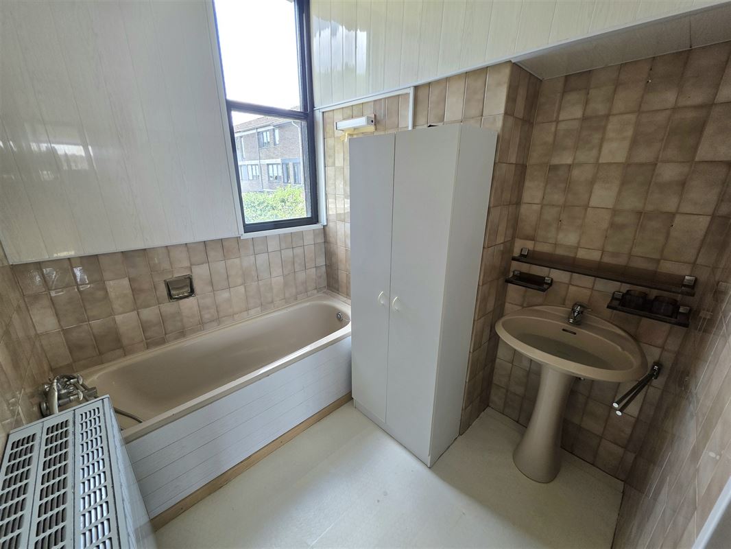 Knappe gezinswoning met 4 à 5 slpks, garage en tuin