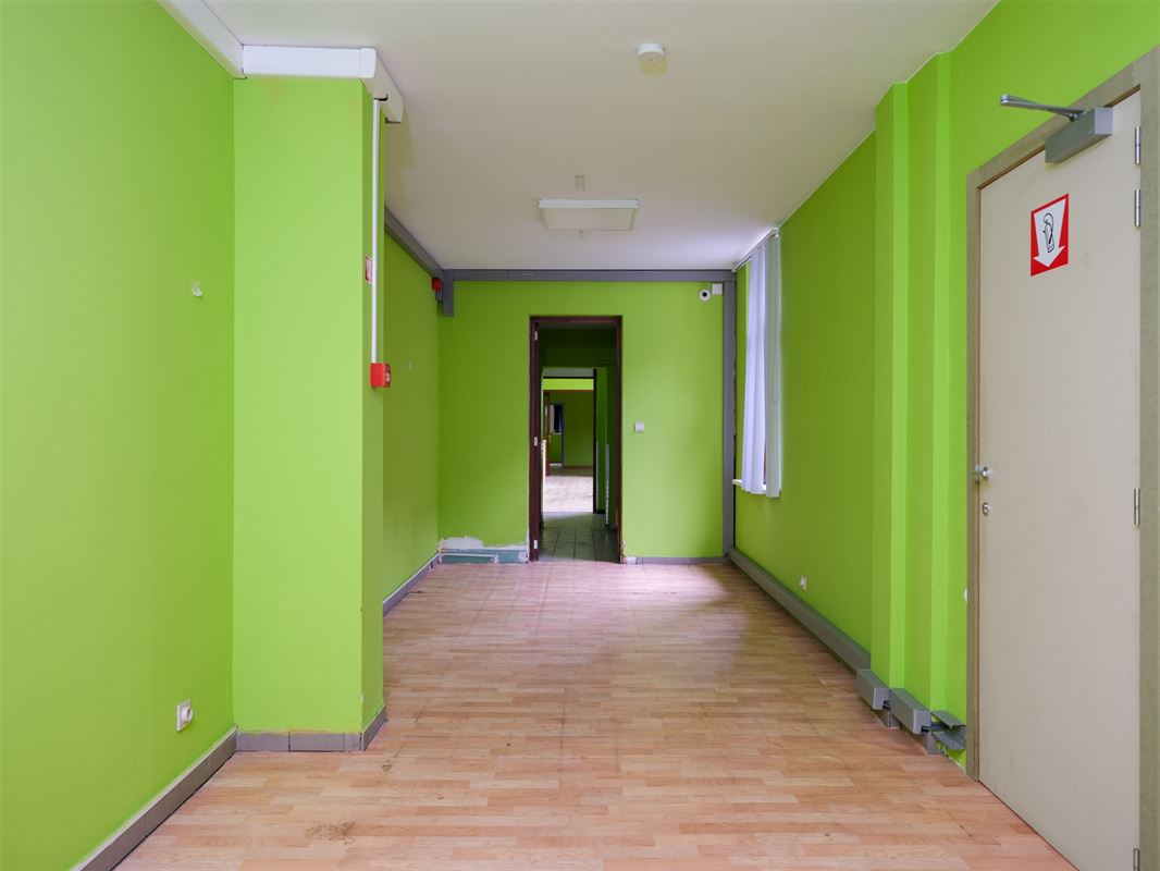 ruime rijwoning met polyvalent bijgebouw en tal van mogelijk