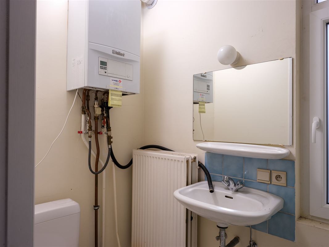 ruime rijwoning met polyvalent bijgebouw en tal van mogelijk