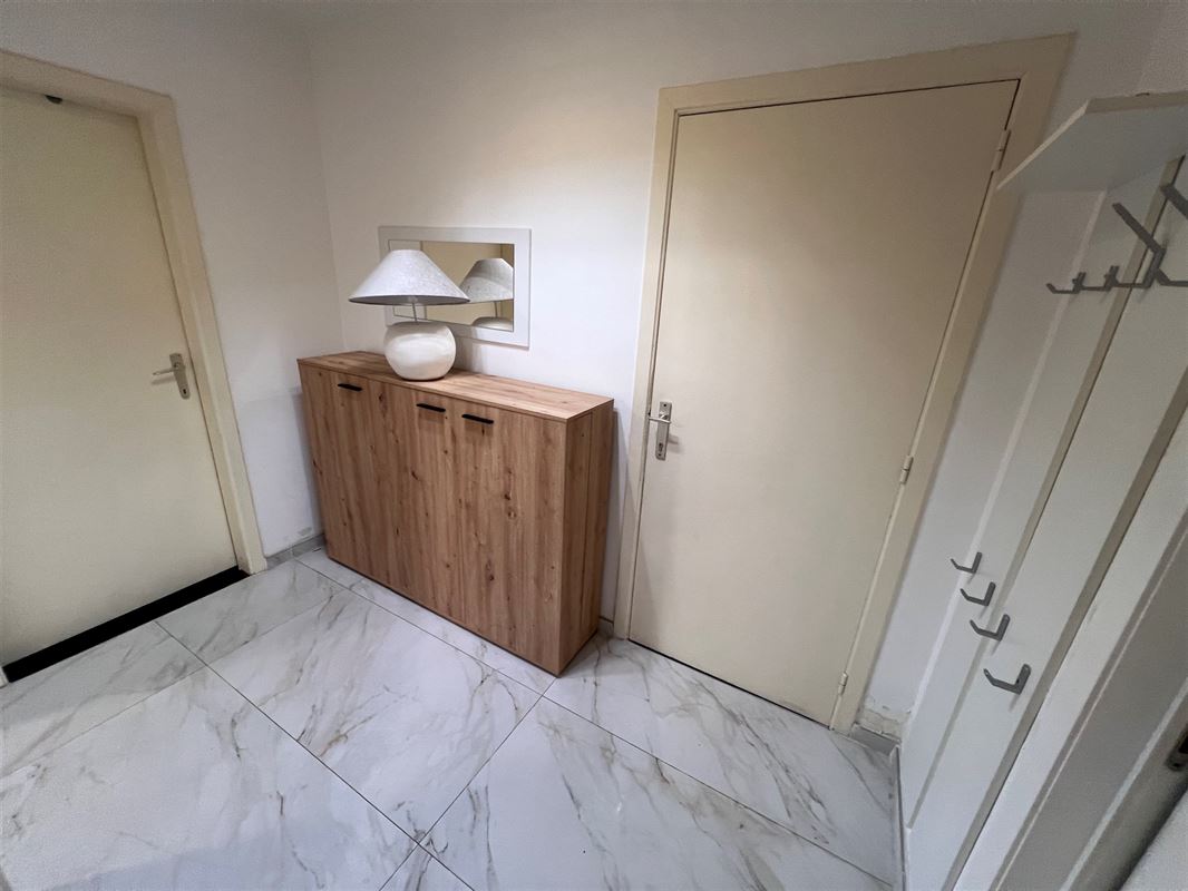 Lichtrijk appartement met 2 slaapkamers, terras en garagebox