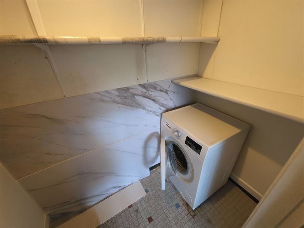 Lichtrijk appartement met 2 slaapkamers, terras en garagebox