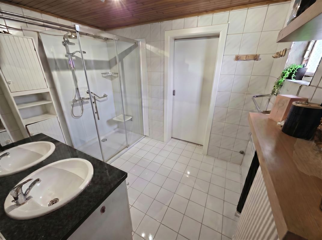 Gezinswoning met 4 slaapkamers en zonnige tuin