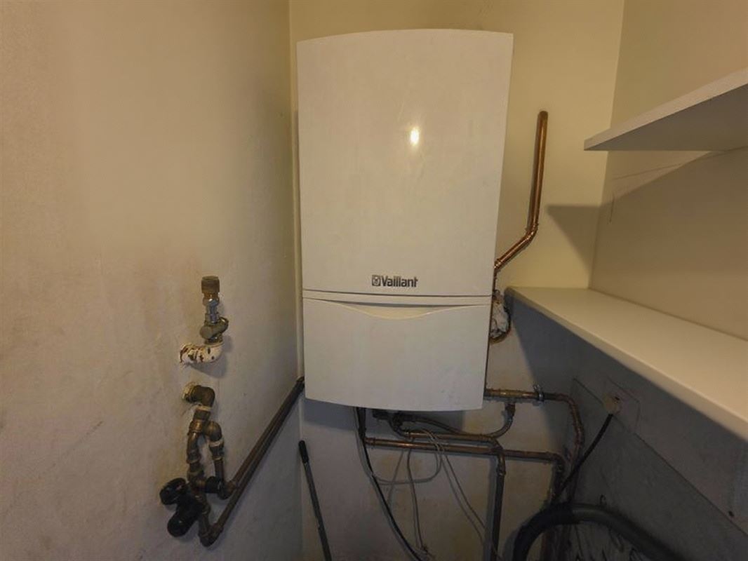 Lichtrijk appartement met 2 slaapkamers, terras en garagebox