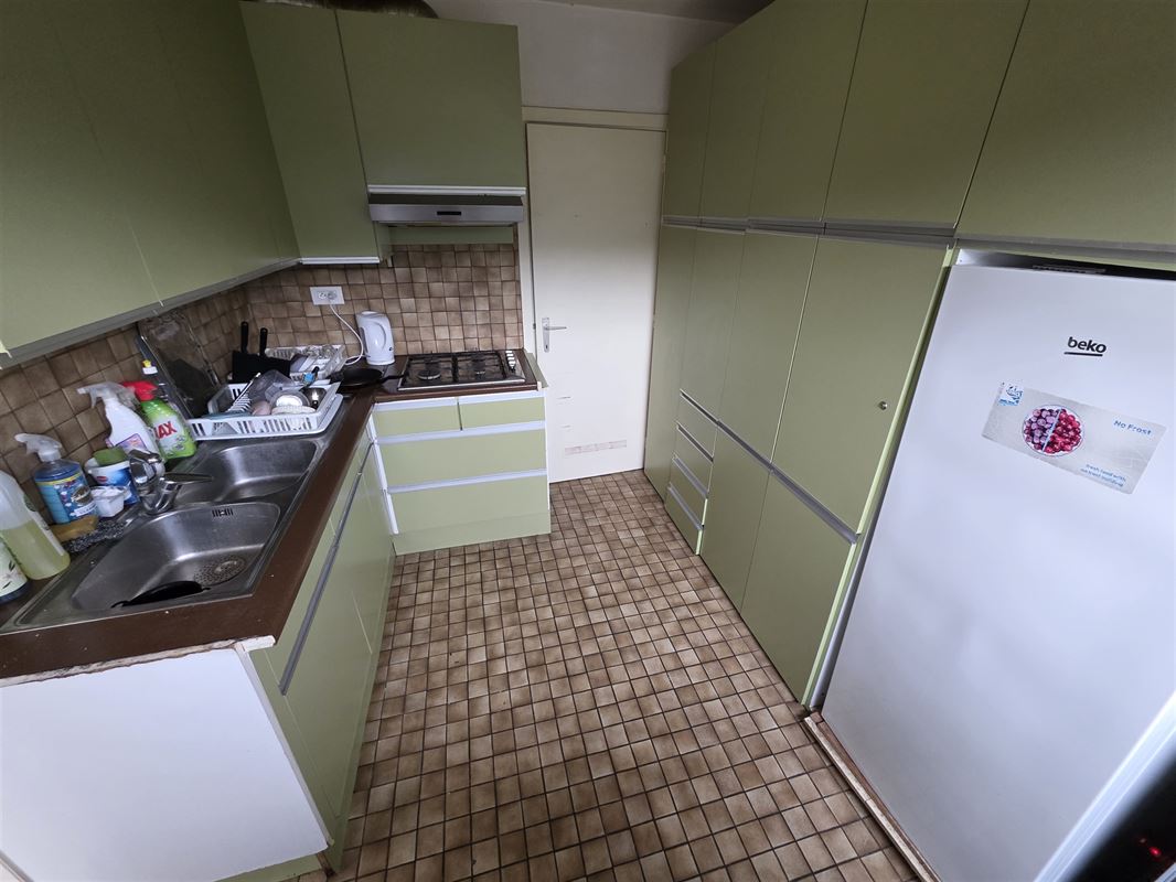 Lichtrijk appartement met 2 slaapkamers, terras en garagebox