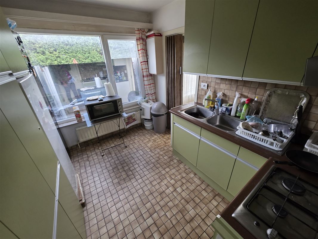 Lichtrijk appartement met 2 slaapkamers, terras en garagebox