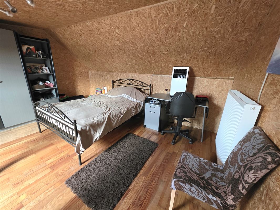 Gezinswoning met 4 slaapkamers en zonnige tuin