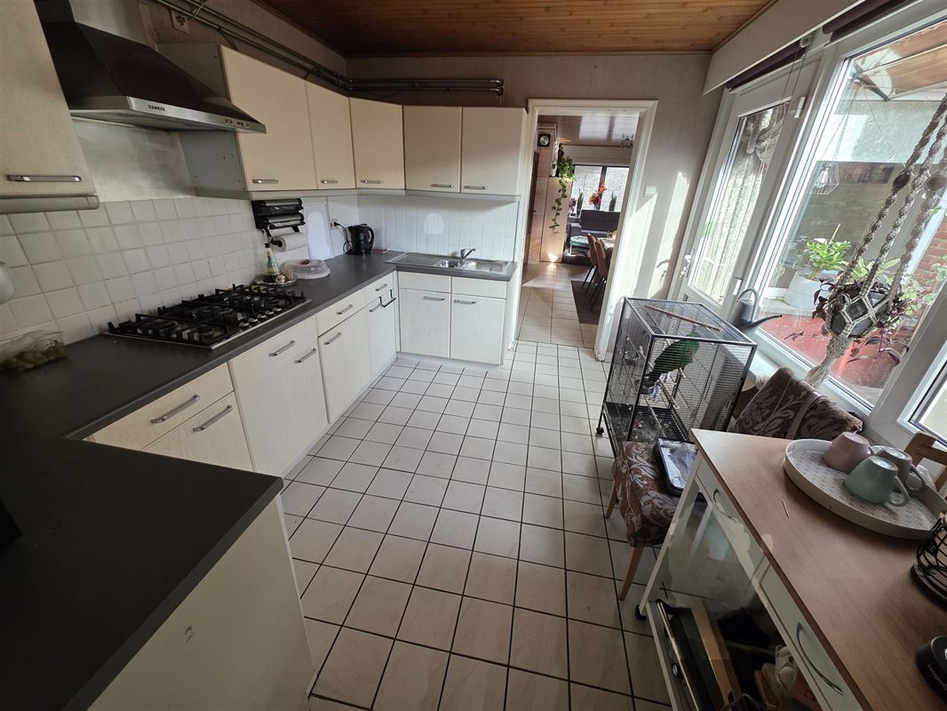 Gezinswoning met 4 slaapkamers en zonnige tuin